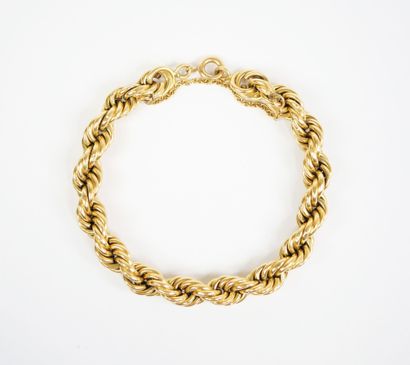 18K yellow gold (750‰) bracelet with twisted...