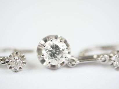 Pair of 18K white gold (750‰) earrings, each...