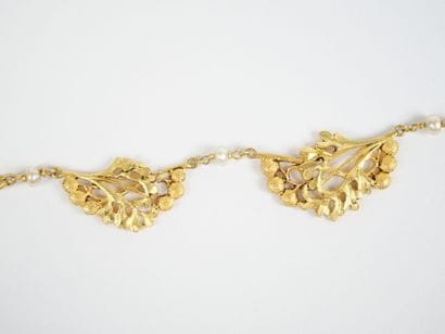 An 18K yellow gold (750‰) necklace with a...