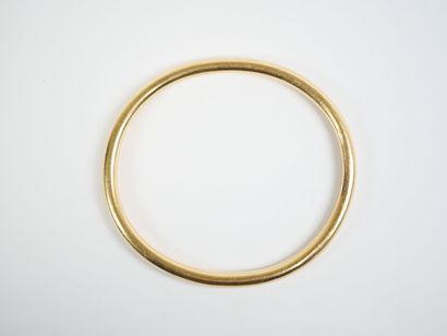 18K yellow gold (750‰) bangle. 
Weight: 27.6...