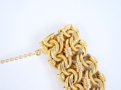 A striking 18K yellow gold (750‰) bracelet...