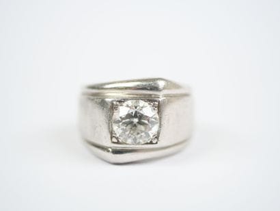 A striking platinum ring featuring a half-size...