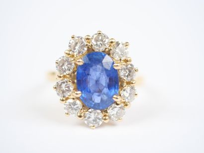 18K yellow gold (750‰) daisy ring set with...