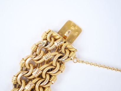 A striking 18K yellow gold (750‰) bracelet...