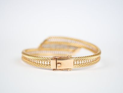 Bracelet in 18K yellow gold (750‰) and white...