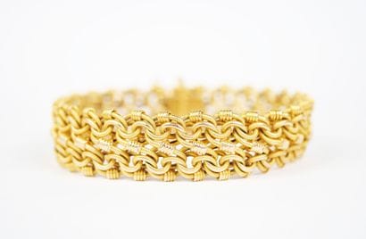 A striking 18K yellow gold (750‰) bracelet...