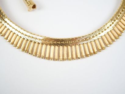 A striking 18K yellow gold (750‰) necklace...