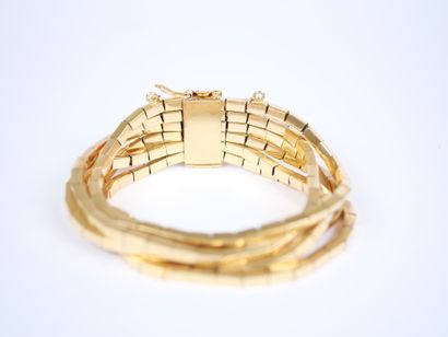 A striking 18K yellow gold (750‰) bracelet...