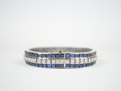 18K white gold (750‰) link bracelet entirely...