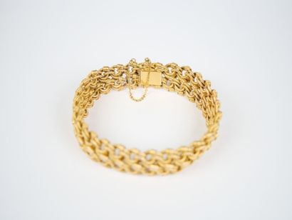 A striking 18K yellow gold (750‰) bracelet...