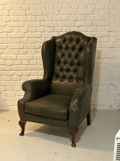 Fauteuil style Chesterfield en cuir vert
115...
