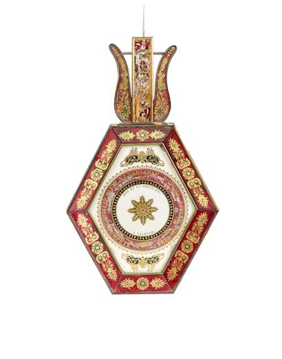Baromètre en verre églomisé, de forme hexagonale,...