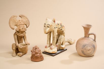 Lot comprenant : 
- Une statuette en terre...