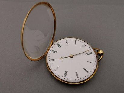 Une MONTRE de poche en or 750 mm à décor...