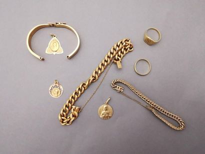 Lot d'or 750 mm 18 K comprenant : 
- un bracelet...