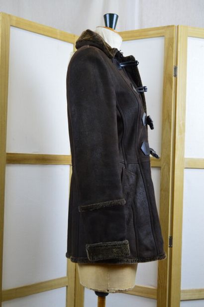 BURBERRY LONDON

Veste en peau lainée marron

Taille...