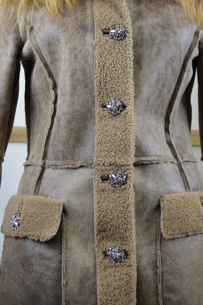 DOLCE GABBANA

Manteau long en peau lainé...