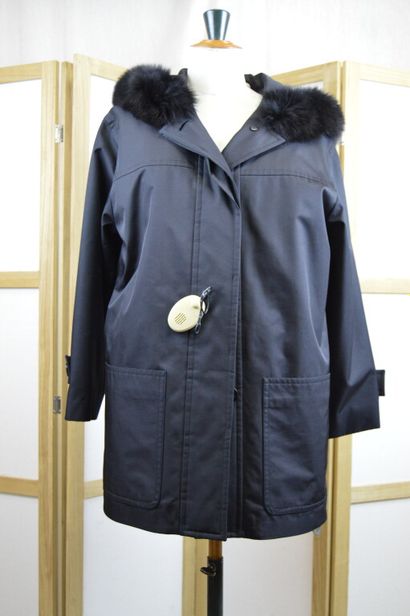 YVES SAINT LAURENT FOURRURE

Parka à capuche...