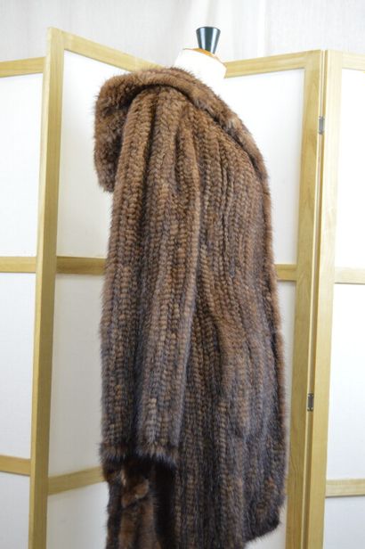 LEDERER

Manteau à capuche en vison tricoté...