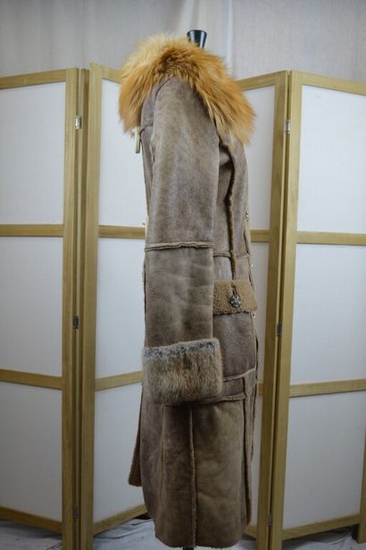 DOLCE GABBANA

Manteau long en peau lainé...