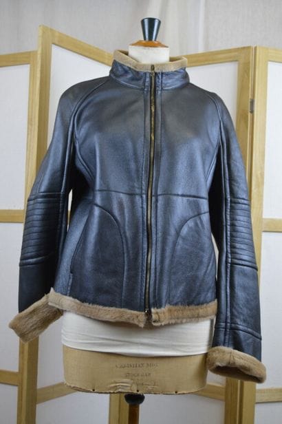 MARCO BALDASSI

Veste en peau lainée noire,...