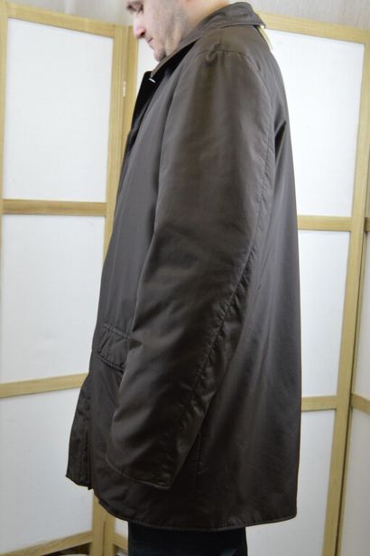 HERMES

Parka d'homme marron, la doublure...