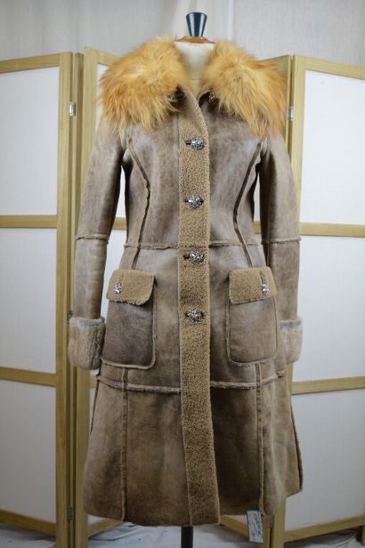DOLCE GABBANA

Manteau long en peau lainé...