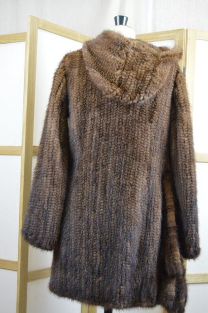 LEDERER

Manteau à capuche en vison tricoté...
