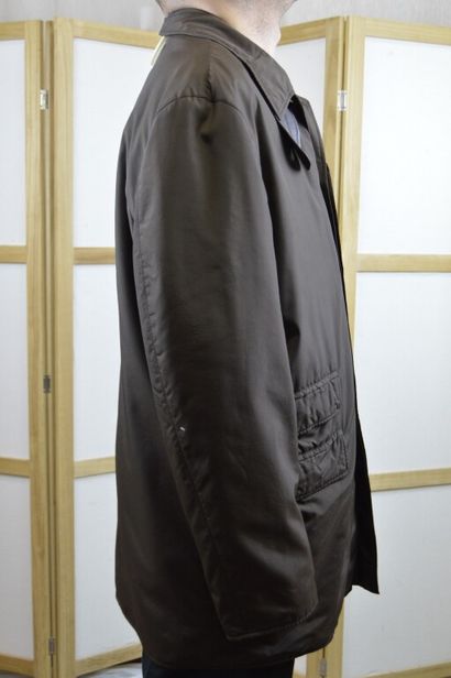 HERMES

Parka d'homme marron, la doublure...