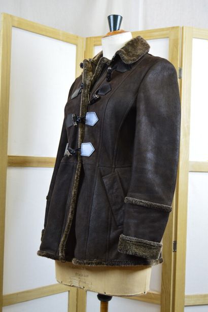 BURBERRY LONDON

Veste en peau lainée marron

Taille...