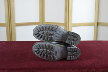 FREE LANCE 

Paire de bottes en cuir gris...