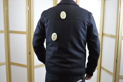 DIOR

Blouson d'homme en lainage noir fermant...