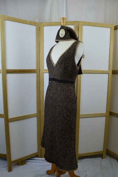 PRADA.

Robe bretelle en laine vierge chiné...