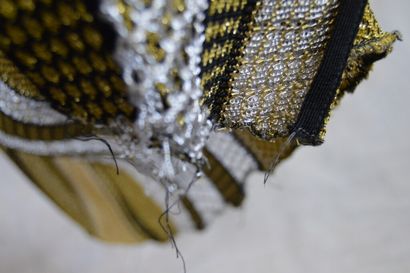 BALMAIN

Pantalon en lainage et lurex doré/noir/argenté....