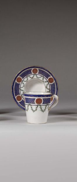 SÈVRES.
Sunken porcelain goblet and saucer...