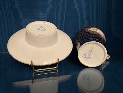 SÈVRES.
Sunken porcelain goblet and saucer...