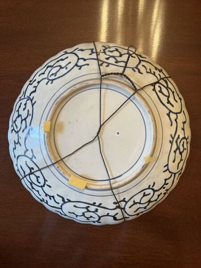 JAPAN.
Porcelain scalloped circular bowl...