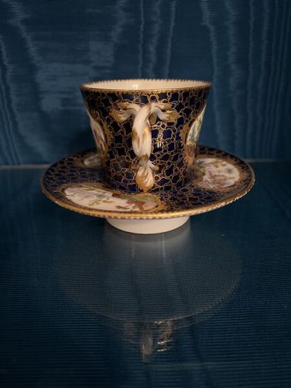 SÈVRES.
Sunken porcelain goblet and saucer...