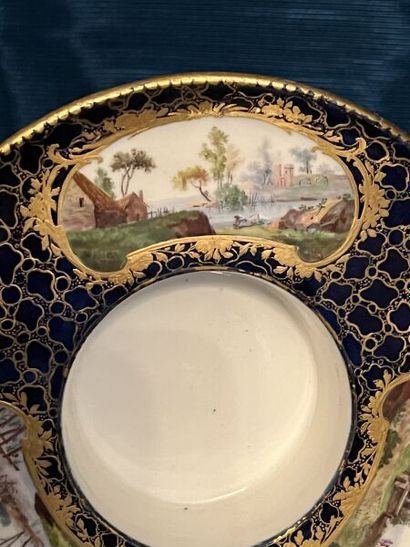 SÈVRES.
Sunken porcelain goblet and saucer...