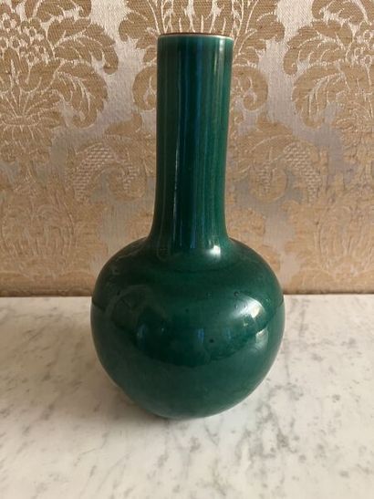 CHINA.
Porcelain bottle vase with green monochrome...