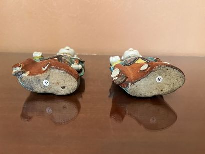 CHINA.
Pair of Ho-ho servants in polychrome...