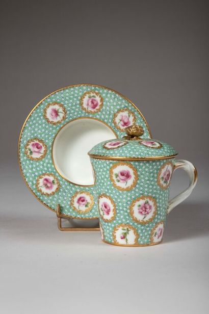 SÈVRES.
Sunken porcelain goblet and saucer...