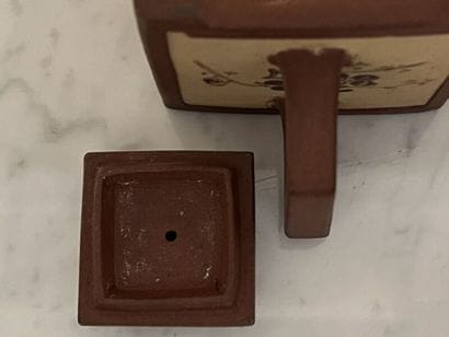 CHINA.
Pair of small teapots in brown tinted...