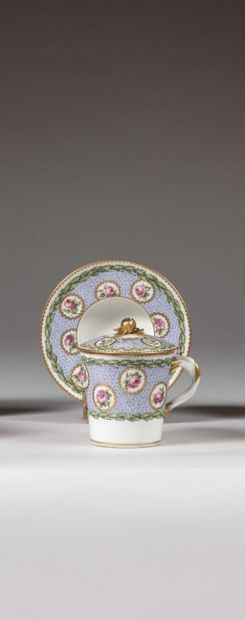 SÈVRES.
Sunken porcelain goblet and saucer...