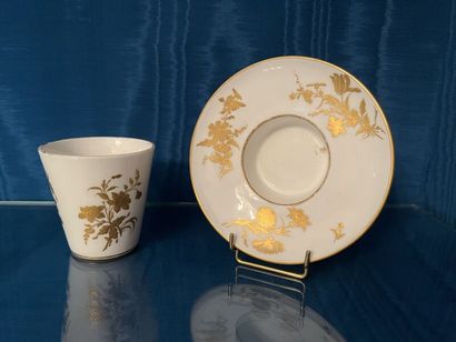SÈVRES.
Sunken porcelain goblet and saucer...