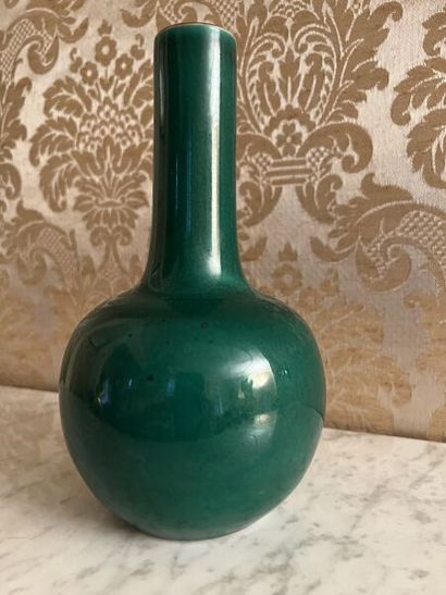 CHINA.
Porcelain bottle vase with green monochrome...