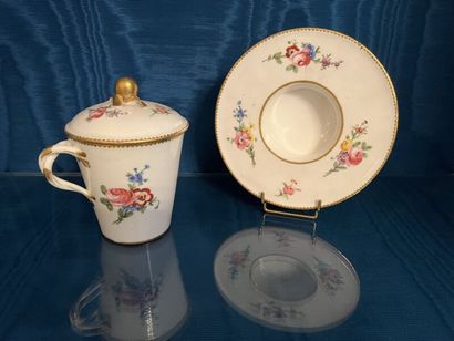 SÈVRES.
Sunken porcelain goblet and saucer...