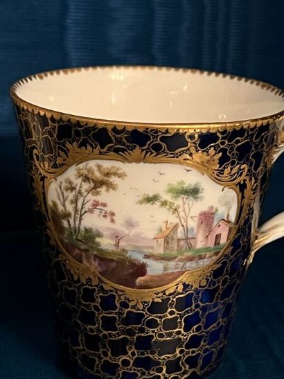 SÈVRES.
Sunken porcelain goblet and saucer...