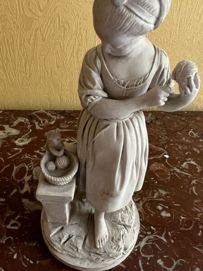 In the Sèvres style. 
Terra cotta statuette...