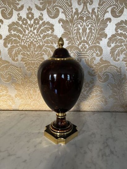 SÈVRES.
Porcelain ovoid vase and cover, painted...